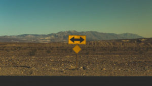 insight or incite? - road sign pointing both ways